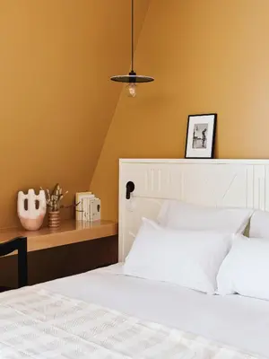Un ou plusieurs lits dans un hébergement de l'établissement Hotel Orphée - Orso Hotels