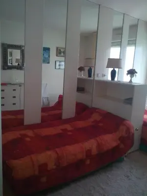 Un ou plusieurs lits dans un hébergement de l'établissement Chambres d'hôtes Issy-Paris