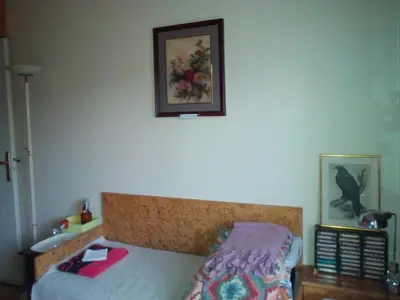 Un ou plusieurs lits dans un hébergement de l'établissement Chambres d'hôtes Issy-Paris