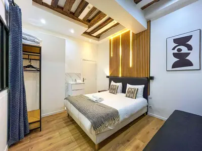 Un ou plusieurs lits dans un hébergement de l'établissement 67 - Amazing Parisian Flat