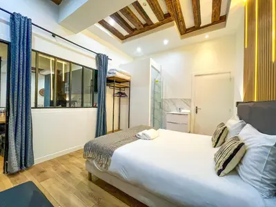 Un ou plusieurs lits dans un hébergement de l'établissement 67 - Amazing Parisian Flat