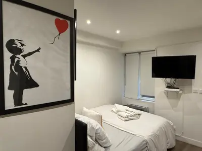 Télévision ou salle de divertissement dans l'établissement LE MARAIS-SAINT MARTIN working & living