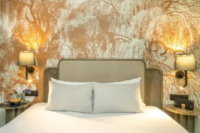 Un ou plusieurs lits dans un hébergement de l'établissement Appart Hotel Avalon