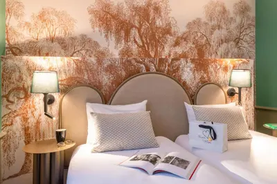 Un ou plusieurs lits dans un hébergement de l'établissement Appart Hotel Avalon