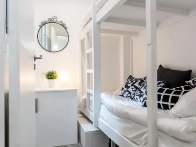 Un ou plusieurs lits dans un hébergement de l'établissement Montmartre Apartments Matisse