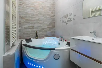 Salle de bains dans l'établissement Havre de Paix Jacuzzi
