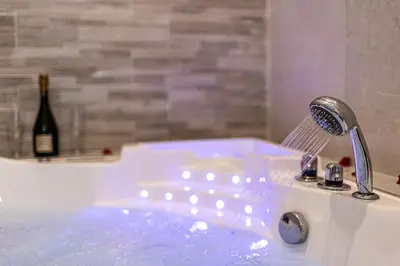 Salle de bains dans l'établissement Havre de Paix Jacuzzi