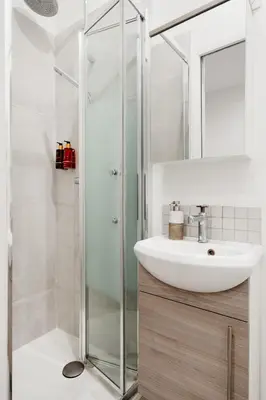 Salle de bains dans l'établissement Edgar Suites Marais - Réaumur