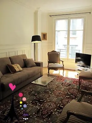 Coin salon dans l'établissement Champs Elysees Argentine CityCosy