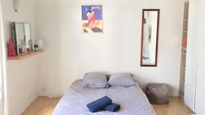 Un ou plusieurs lits dans un hébergement de l'établissement Cosy 25 sqm Studio in Heart of Paris