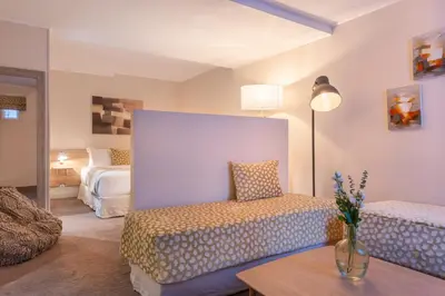 Un ou plusieurs lits dans un hébergement de l'établissement Hotel 29 Lepic