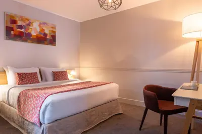 Un ou plusieurs lits dans un hébergement de l'établissement Hotel 29 Lepic