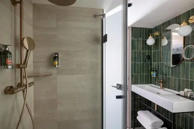 Salle de bains dans l'établissement Hôtel Maxim Opéra