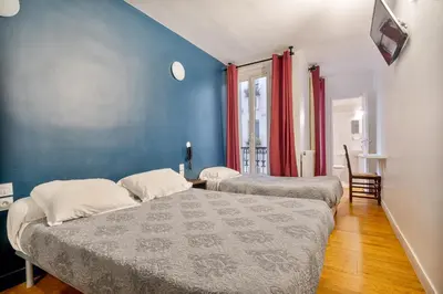 Un ou plusieurs lits dans un hébergement de l'établissement Hotel de Nantes