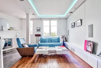 Coin salon dans l'établissement Luxury Stay Paris Place des Vosges