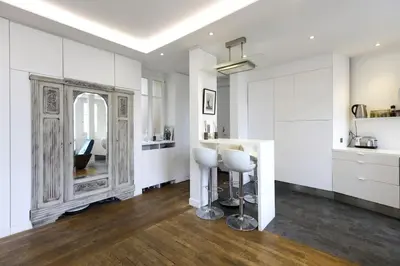 Cuisine ou kitchenette dans l'établissement Luxury Stay Paris Place des Vosges