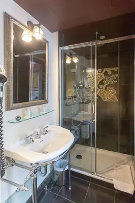 Salle de bains dans l'établissement Hotel Du Beaumont