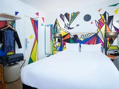Un ou plusieurs lits dans un hébergement de l'établissement ibis Styles Paris Maine Montparnasse