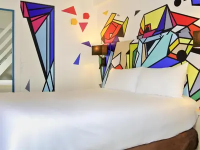 Un ou plusieurs lits dans un hébergement de l'établissement ibis Styles Paris Maine Montparnasse