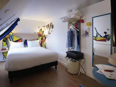 Un ou plusieurs lits dans un hébergement de l'établissement ibis Styles Paris Maine Montparnasse