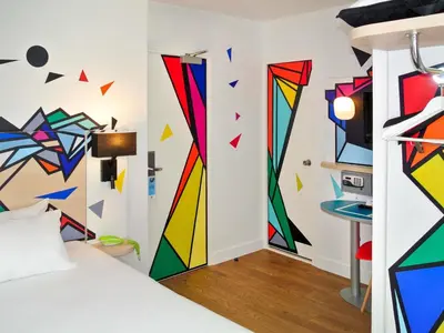 Un ou plusieurs lits dans un hébergement de l'établissement ibis Styles Paris Maine Montparnasse