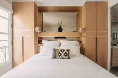 Un ou plusieurs lits dans un hébergement de l'établissement HIGHSTAY - Luxury Serviced Apartments - Place Vendôme