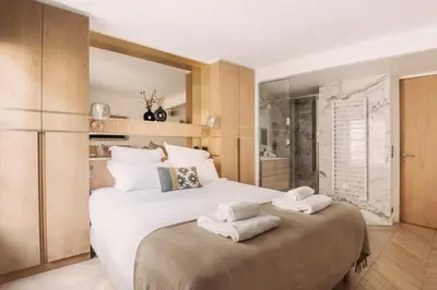 Un ou plusieurs lits dans un hébergement de l'établissement HIGHSTAY - Luxury Serviced Apartments - Place Vendôme