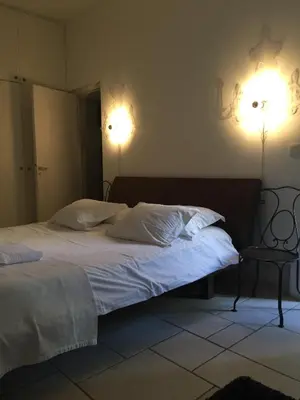 Un ou plusieurs lits dans un hébergement de l'établissement Boutique Hotel de la Place des Vosges