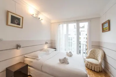 Un ou plusieurs lits dans un hébergement de l'établissement Veeve - Apartment near Pont de Grenelle