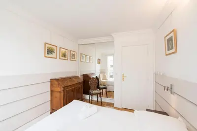 Un ou plusieurs lits dans un hébergement de l'établissement Veeve - Apartment near Pont de Grenelle