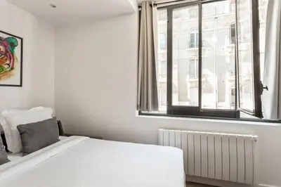 Un ou plusieurs lits dans un hébergement de l'établissement Modern studio perfectly equipped and renovated