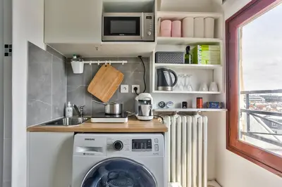 Cuisine ou kitchenette dans l'établissement Charming Studio - Palais de Congres