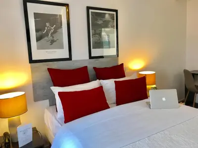 Un ou plusieurs lits dans un hébergement de l'établissement Hôtel Clairefontaine