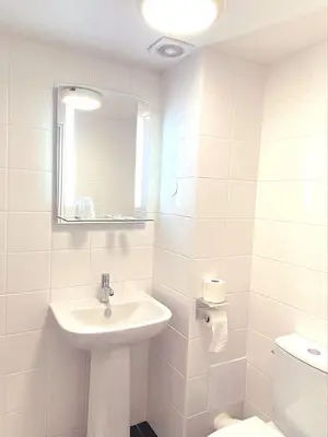 Salle de bains dans l'établissement Hotel Aviatic