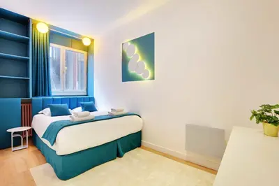 Un ou plusieurs lits dans un hébergement de l'établissement Modern apartment - 1BR-6P - AC - Marais
