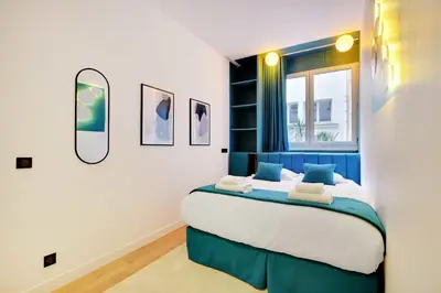 Un ou plusieurs lits dans un hébergement de l'établissement Modern apartment - 1BR-6P - AC - Marais