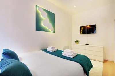 Un ou plusieurs lits dans un hébergement de l'établissement Modern apartment - 1BR-6P - AC - Marais