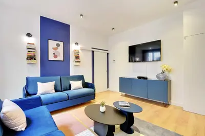 Coin salon dans l'établissement Modern apartment - 1BR-6P - AC - Marais