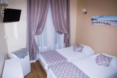 Un ou plusieurs lits dans un hébergement de l'établissement Hôtel du Mont Blanc