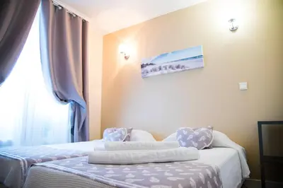Un ou plusieurs lits dans un hébergement de l'établissement Hôtel du Mont Blanc