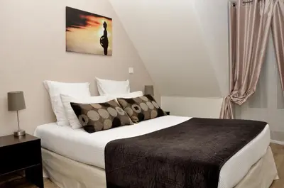 Un ou plusieurs lits dans un hébergement de l'établissement Hôtel du Mont Blanc
