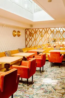 Coin salon dans l'établissement Hôtel Thoumieux