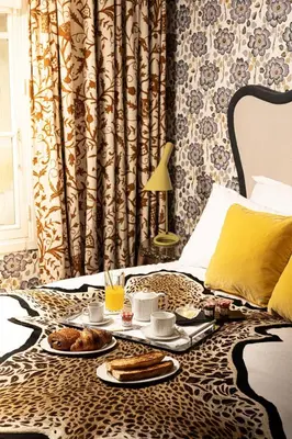 Coin salon dans l'établissement Hôtel Thoumieux