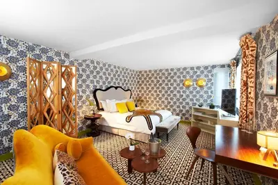 Coin salon dans l'établissement Hôtel Thoumieux