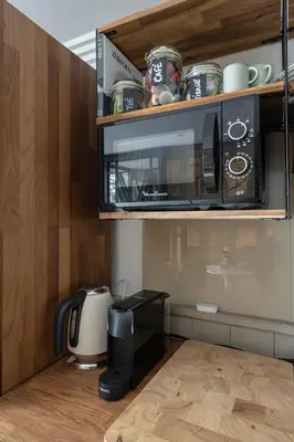 Cuisine ou kitchenette dans l'établissement Square Studio