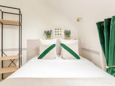 Un ou plusieurs lits dans un hébergement de l'établissement Merveil Luxury Suite Royale II - Saint Honore view