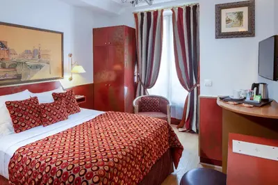 Un ou plusieurs lits dans un hébergement de l'établissement Hôtel du Levant