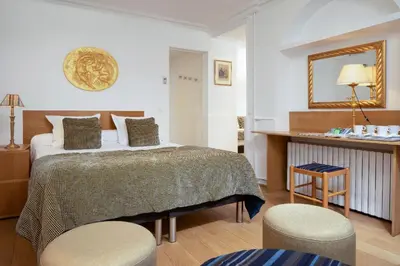 Un ou plusieurs lits dans un hébergement de l'établissement Hôtel du Levant