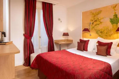 Un ou plusieurs lits dans un hébergement de l'établissement Hôtel du Levant