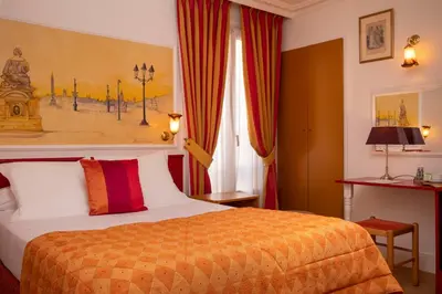 Un ou plusieurs lits dans un hébergement de l'établissement Hôtel du Levant